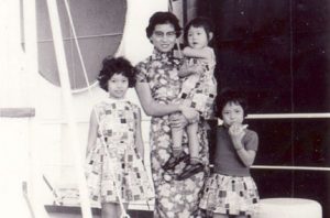 Elaine, her mother, and two sisters aboard the cargo ship that brought them to America.
